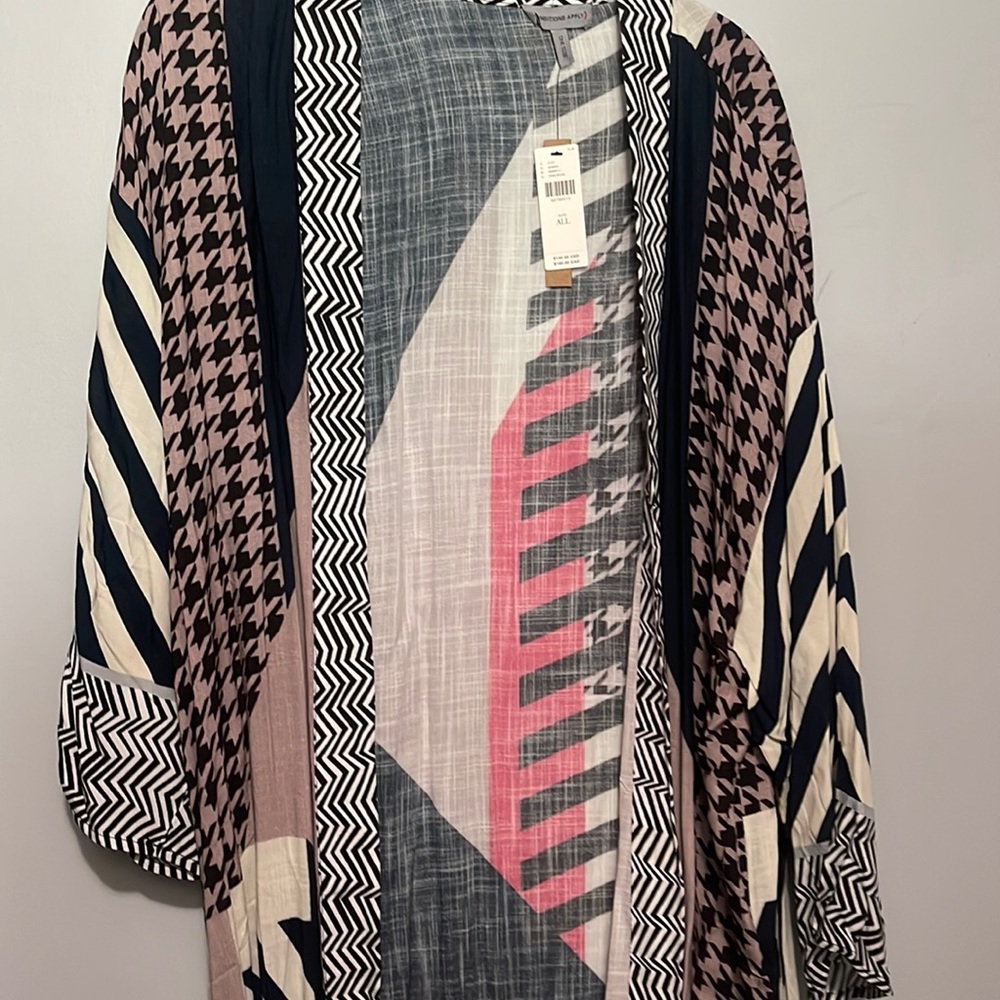 Conditions Apply size all kimono. Brand new with tags.